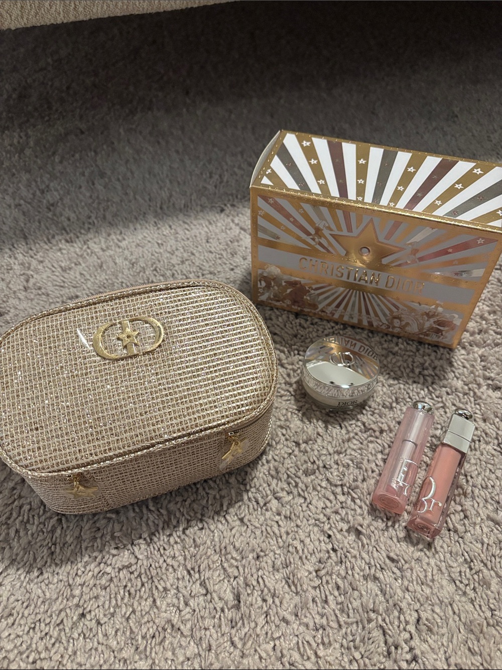 Dior Gold Travel Case with Dior addict lip glow, lip maximizer and day cream